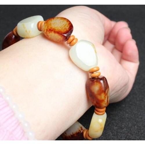 Natural Xinjiang Hetian jade belt skin seed stone hand string transfer Pearl Zhaocai transfer jade BRACELET
