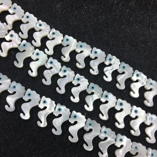 60pcs/los 10*17mm MOP white Shell Geschnitzte Blue blick Perlen Seepferd Form Brenn Gebohrt Perlen unique design for gifts