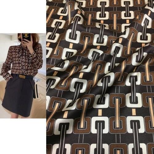 Vertical chain geometric printing black coffee bottom stretch digital printing natural mulberry silk high fashion textile fabric