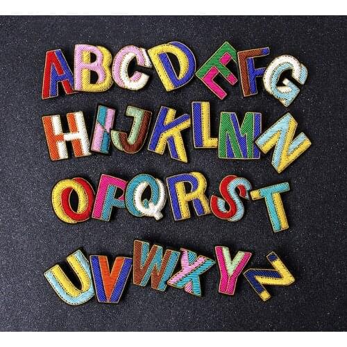 26 letter Embroidered Patches Pure hand - embroidered with metal spring copper wire badges a pin on the back