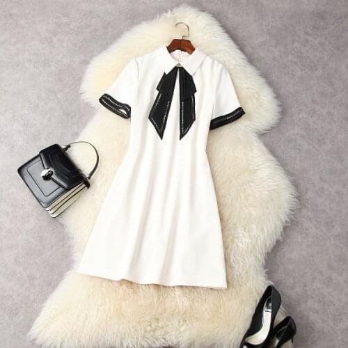 European and American womens wear for summer 2021 Short sleeve lapel Hollow bow Fashion dress in solid color