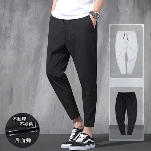 2021 New Korean Ice Silk Elastic Trousers Four Seasons Thin Casual MenS Loose 9-Point Large Size Small Foot Sports Pants Spring
