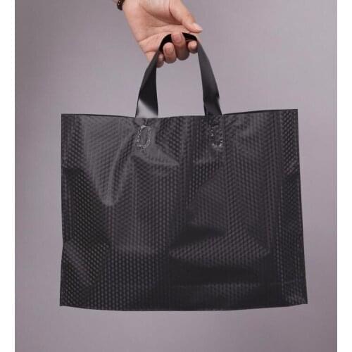 Wholesale Plastic packaging bag 50 pcs carrier bag for shopping good quality plastic bags plastic gift bags with handles