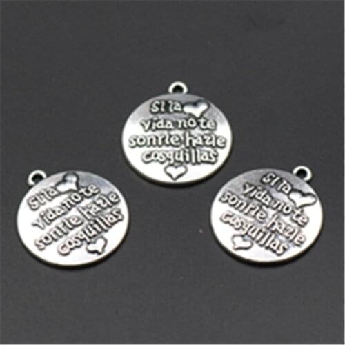WKOUD 10pcs Antique silve smile to life and life will return that smile charm inspirational round tablets alloy pendants A666