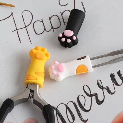 A0ND Nail Nipper Tweezers Cuticle Scissors Protective Sleeve Cat Paw Shape Silicone Manicure Pedicure Tool