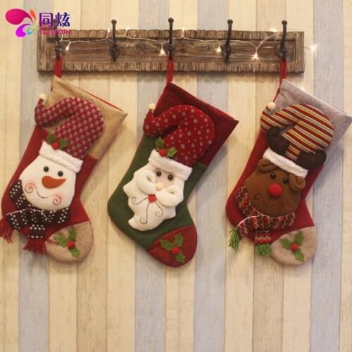 Christmas decorations Christmas stockings window dressing hanging ornaments old man Snowman deer socks gift bags