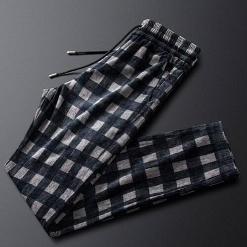 Fall/winter corduroy plaid casual pants mens self-cultivation feet drape drawstring trousers mens Korean style trendy pants