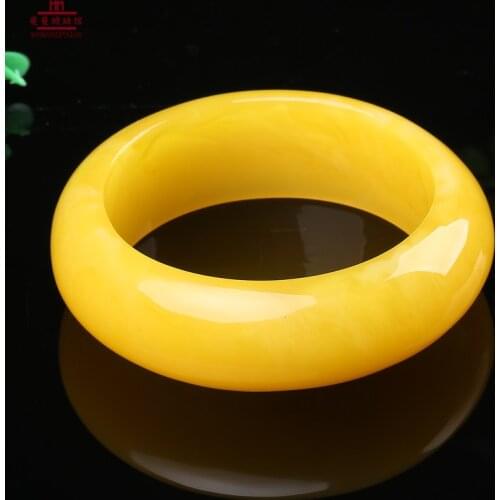 The new female chicken oil beeswax Bracelet yellow amber bracelet