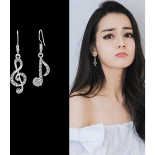 2018 new hot personality fashion high quality cute popular special music dream symbol asymmetrical earrings actress with the sam