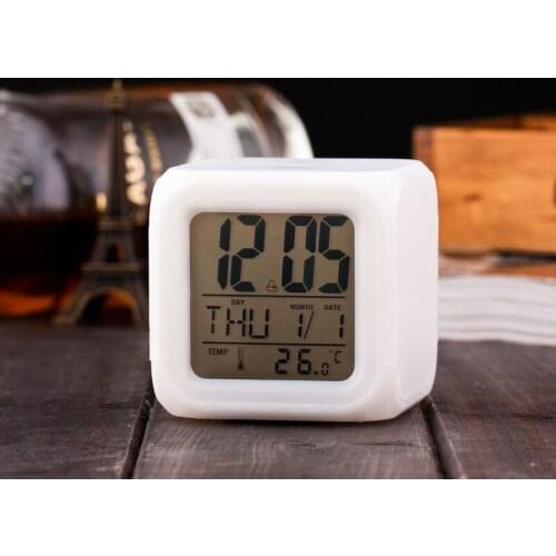 Free shipping 2018 New LED Digital 7 Color Change Alarm Clock Sounds Calendar Temperature Night Glowing Cube LCD Desk Clock