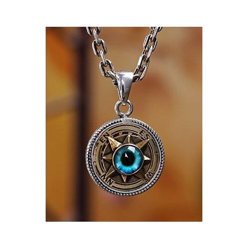 New s925 silver personalized round brand eyeball pendant fashion trend men and women can wear rotating pendant