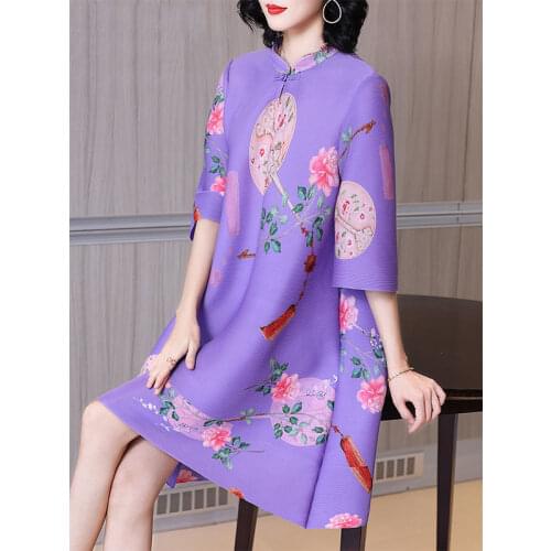 Pleated age-reducing dress 2021 spring new womens loose big covering belly looks thin