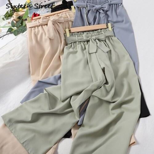 Fashion strap bud elastic waist solid color casual pants womens summer wear Korean loose slim wide-leg pants nine pants
