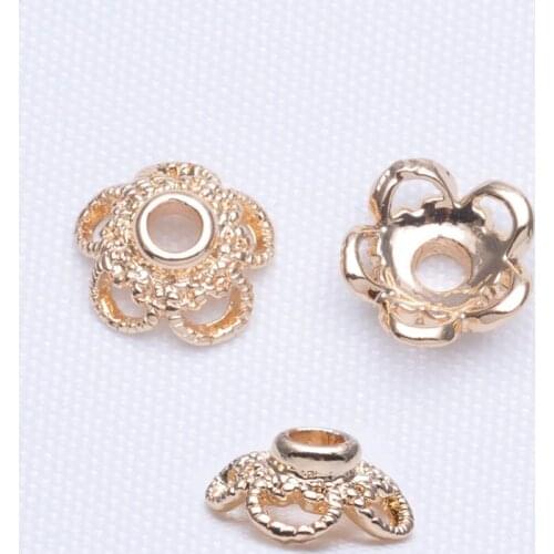 Hollow plum flower receptacle accessory spacer in stock 9*3.6*2.3mm24K real gold flower hat bead hat diy jewelry accessories