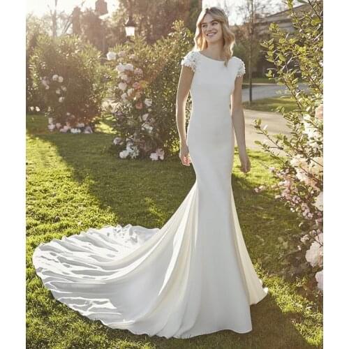 Elegant Mermaid Wedding Dress 2021 O-Neck Cap Sleeve Appliques Sequins Backless Satin Sweep Train Bride Gown Vestidos De Noiva