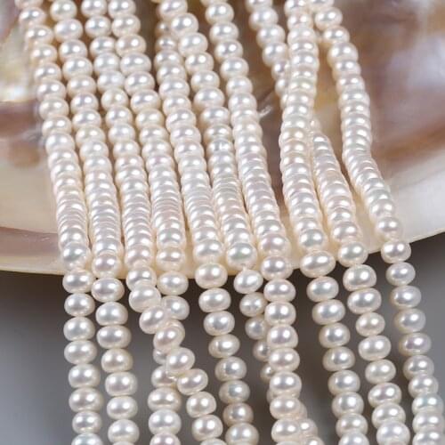 7-8 mm AAA Centre Hole Natural Fresh Water Button Shape Pearl