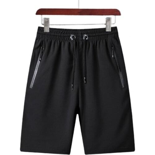 Men Shorts Loose Solid Color Zipper Pockets Drawstring Quick Dry Knee-length Pants Outdoor Sports 5XL Shorts Summer 2021