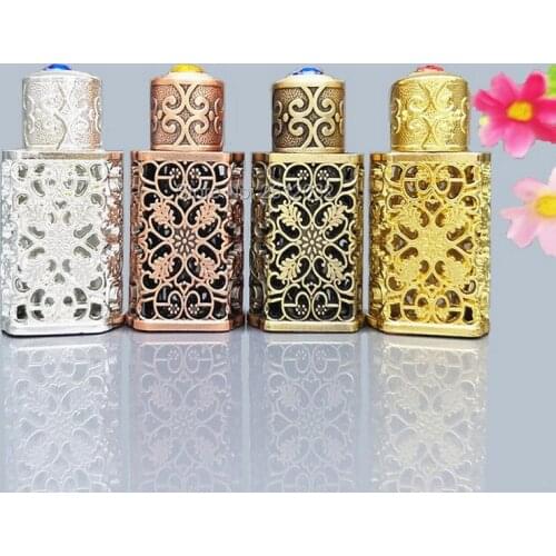 3ml Antiqued Metal Perfume Bottle Arab Style Alloy Hollow out Essential Oils Bottle Middle East Glass Dropper Bottle