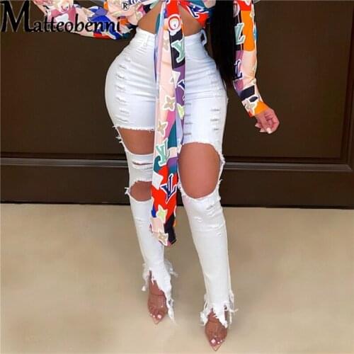 Fashion White Knee Hole Jeans For Women Sexy Butt Lift Skinny Pencil Trousers High Waist Ripped Tassel Denim Pants Plus Size 3XL
