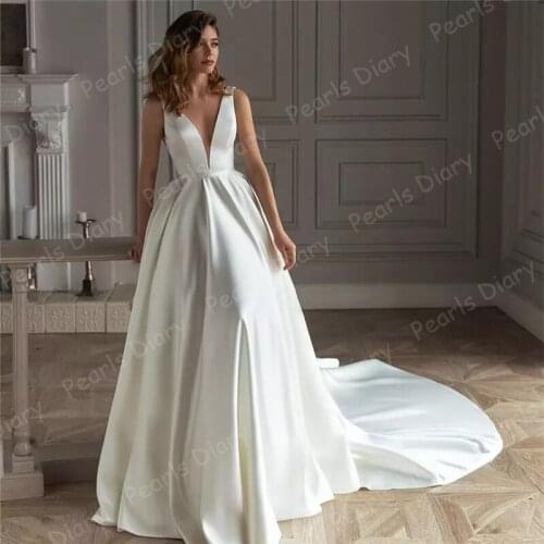 Amazing White Satin Wedding Dresses 2021 Robe De Mariee Women A-line V-Neck Beading Backless Bridal Gown Sweep Train Bride Dress