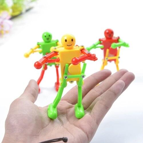 1Pc Random Funny Kids Toys Spring Clockwork Toy Mini Dance Robot Wind Up Toys For Children Boys Educational Toys
