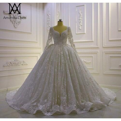 Off White Long Sleeve Lace Ball Gown Crystal Straps Wedding dress