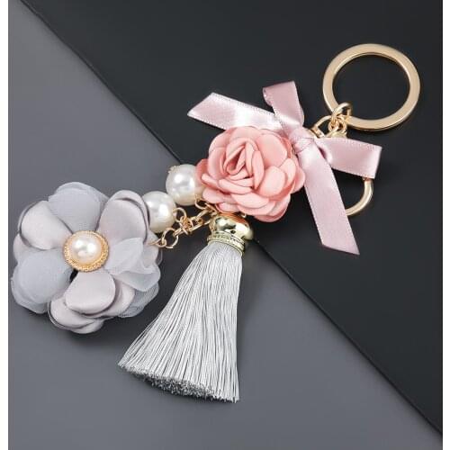 Pauli Manfi Fashion Creative Metal Imitation Pearl Flower Artificial Leather Tassel Keychain Girl Backpack Pendant Accessory