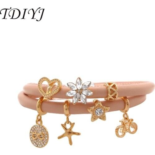 TDIYJ New Design Pink Champagne Story Bracelet with 7pcs Gold Sparkling Charms 40cm Double Layer Genuine Leather Charms Bracelet