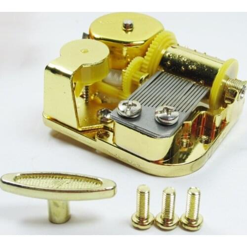 Golden wind up music box mechanism-Hedwigs theme