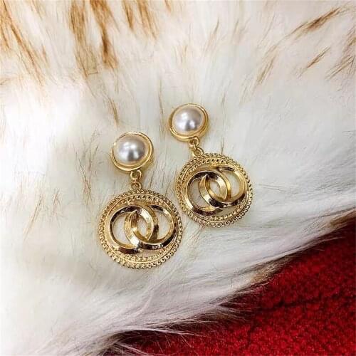 Korean version of the retro palace style pearl earrings female ladies temperament geometric circle pop earrings earrings