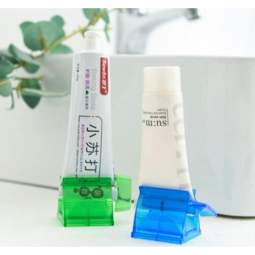Toothpaste Tube Squeezer Dispenser Rolling Tooth Cleaning Clip Bathroom Accessory Plastic Manual Toothpaste Rolling Holder Tool