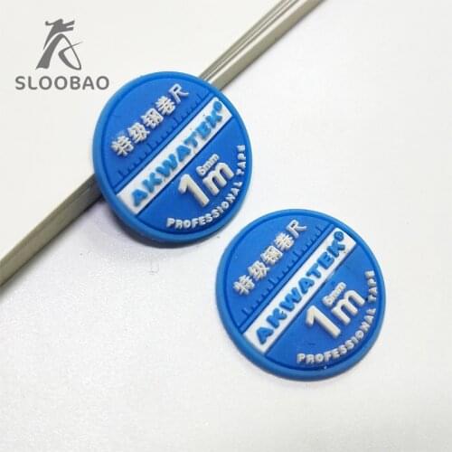 Customized 1000pcs round rubber labels embossed logo/design of plastic tags for clothing/Garment/Shoes/Bags labels high quality