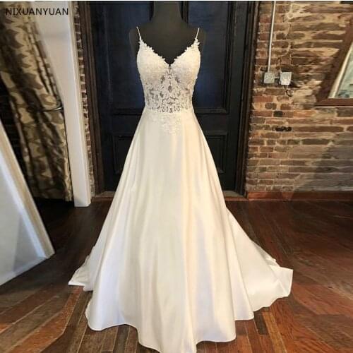 2021 Elegant Wedding Dresses A-line Appliques Spaghetti Straps Vestido De Noiva Illusion Bodice Backless White Wedding Gowns