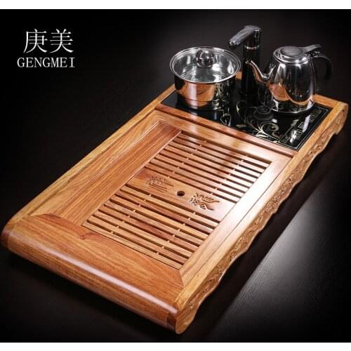 Beautiful wood rosewood tea tray Geng Kung Fu Tea cooker four in one tray factory direct sales