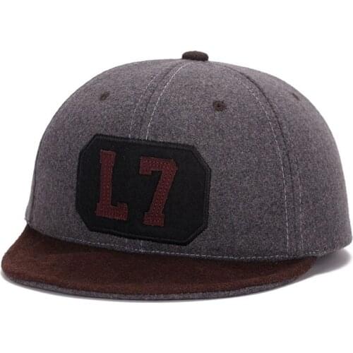 2019 men and women turn woolen color matching warm hat New Korean version of hip hop baseball cap autumn and winter