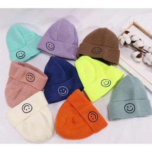 Childrens wool hats South Korea autumn and winter new warmth smiling face knit hats pullovers hats boys and girls hats candy