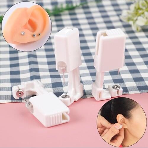 2Pcs Disposable Sterile Unit Ear Nose Stud Piercing Gun Piercer Tool Machine Kit