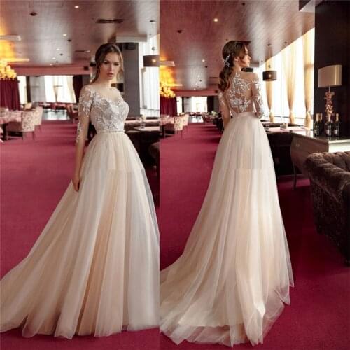Sheer Half Sleeves A-Line Tulle Lace Appliques Wedding Dress Bridal Gowns With Buttons Back Beautiful Middle East Maxi Dress