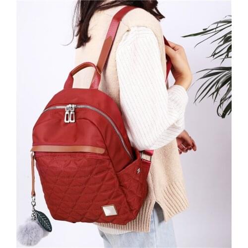 Red brand ladies backpack 2020 new hair ball youth girl student bag main style luxury women bags designer purse