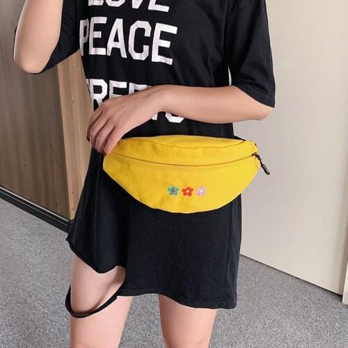 Fashionable and leisure single shoulder waistband foreign girl oblique brooch embroidery small flower and pure color ladys bag