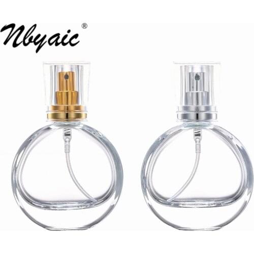 Nbyaic High-end round transparent glass bottle gold and silver perfume sub-bottom 25ml portable press spray empty bottle 1pcs