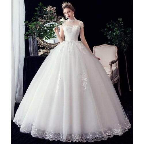 New Tassel Applique Illusion Vestido De Noiva 2021 High Neck Backless Lace Wedding Dress Short Sleeve Bride Brdial Gown