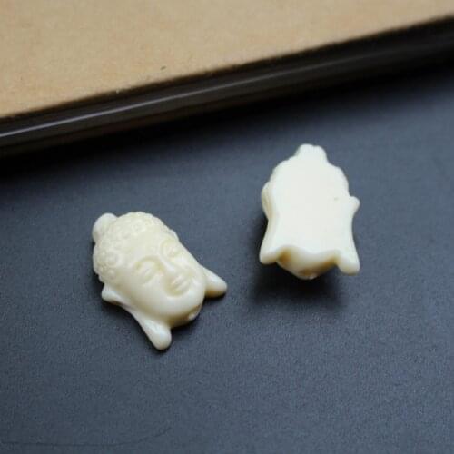 10pieces/lot) Synthetic Coral Buddha head shape Synthetic Coral beads Beige color for Jewelry making