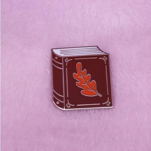 Fall into books hard enamel pin literary bookish readers fun pun addition