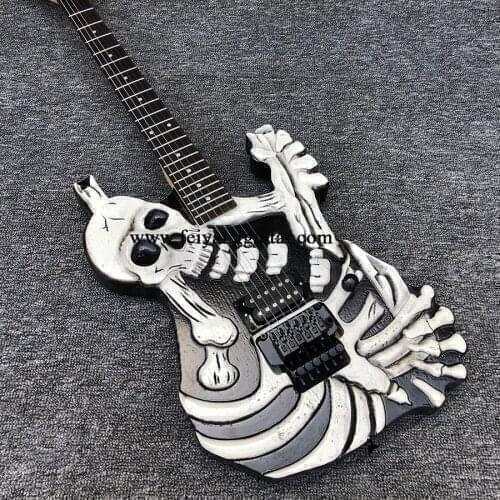 High quality 6 string electric guitar, alien guitar, skull electric guitar, white painted paint, maple neck, black accessories