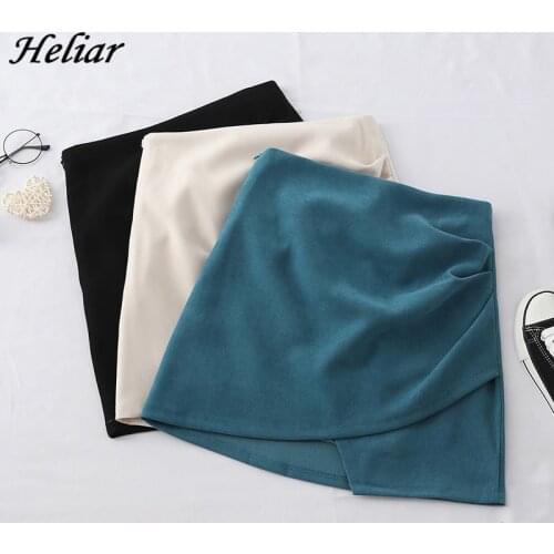 HELIAR Solid Irregular Skirt Hem A-Line Micro Beach Skirt Preppy Style Skirt With Pleated High Waist Skirt For Women 2020 Summer