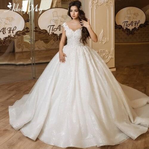 Adoly Mey Elegant Scoop Neck Cap Sleeve Ball Gown Wedding Dress 2020 Luxury Beaded Appliques Sparkly Tulle Princess Bridal Gown