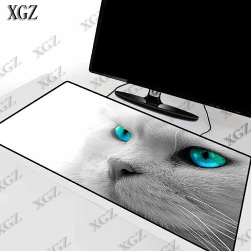 XGZ White Cat Blue Eyes Animal Large Gaming Mouse Pad Gamer Locking Edge Keyboard Mat Desk for CSGO LOL Dota Game XXL