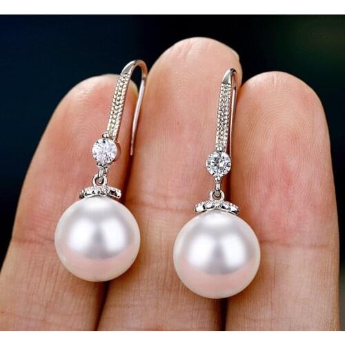 Elegant Female White Pearl Dangle Drop Earrings Temperament Bridal Earrings Wedding Jewelry Premium Earrings for Women Jewelry