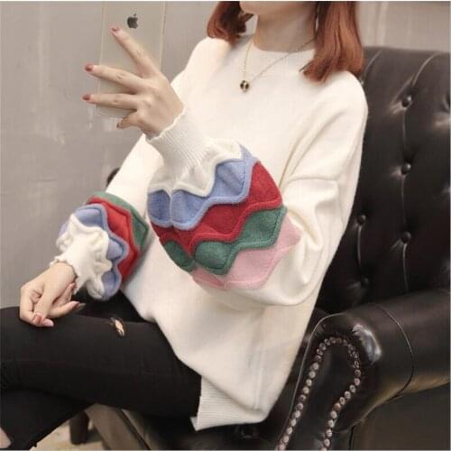 2020 autumn and winter new loose round neck color wide-sleeved sweater hem hole lazy wind pullover sweater women